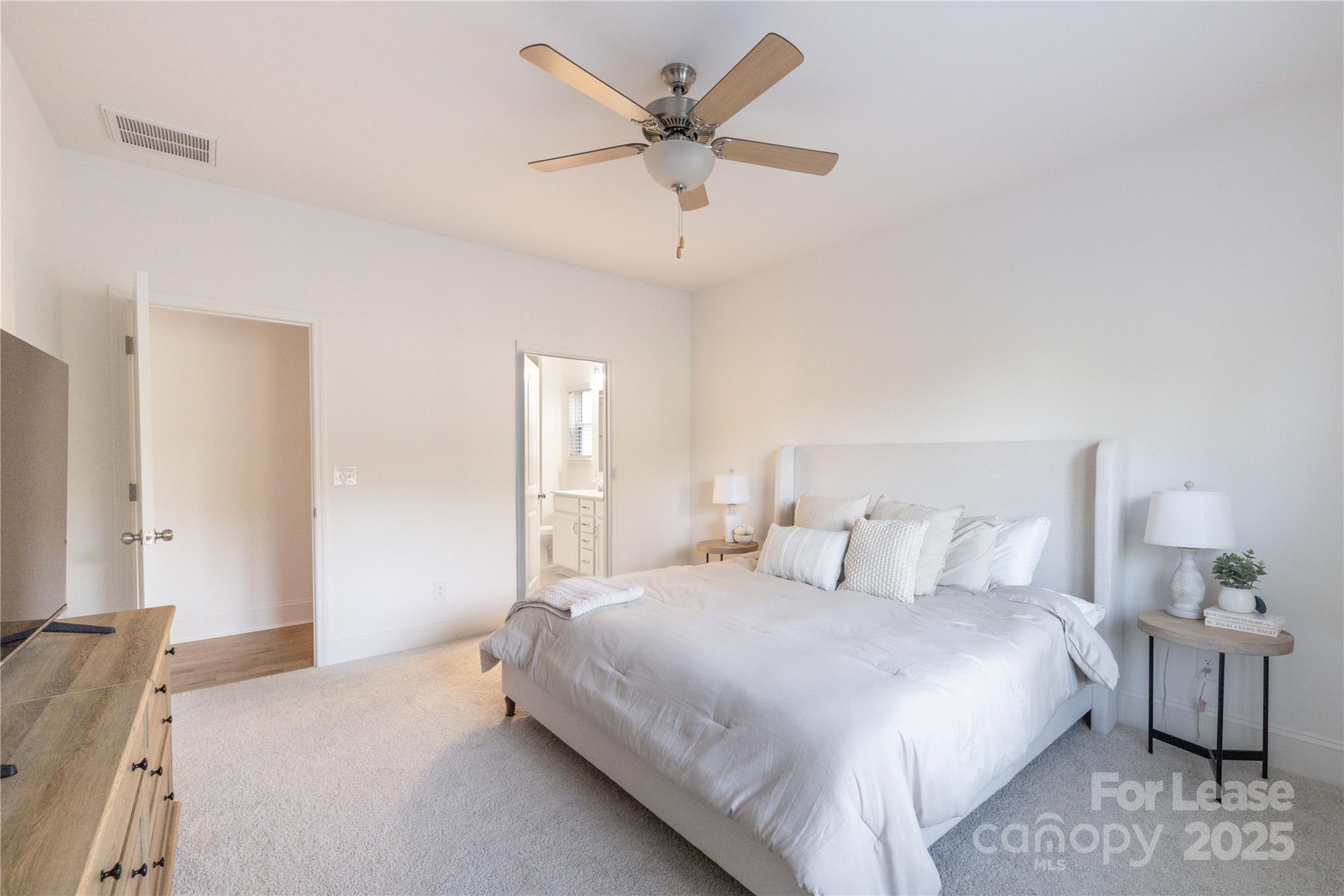 173 Tillery Lane Mount Gilead, NC 27306 - Photo 17 of 28 a bedroom with a bed and window