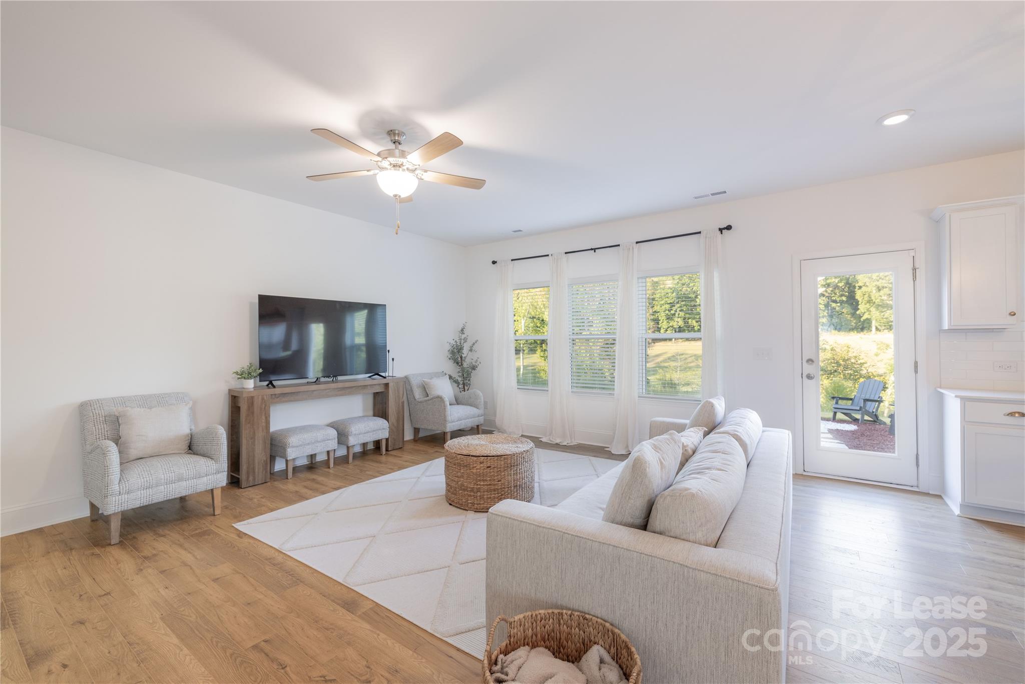 173 Tillery Lane Mount Gilead, NC 27306 - Photo 20 of 28 a living room with furniture and a large window