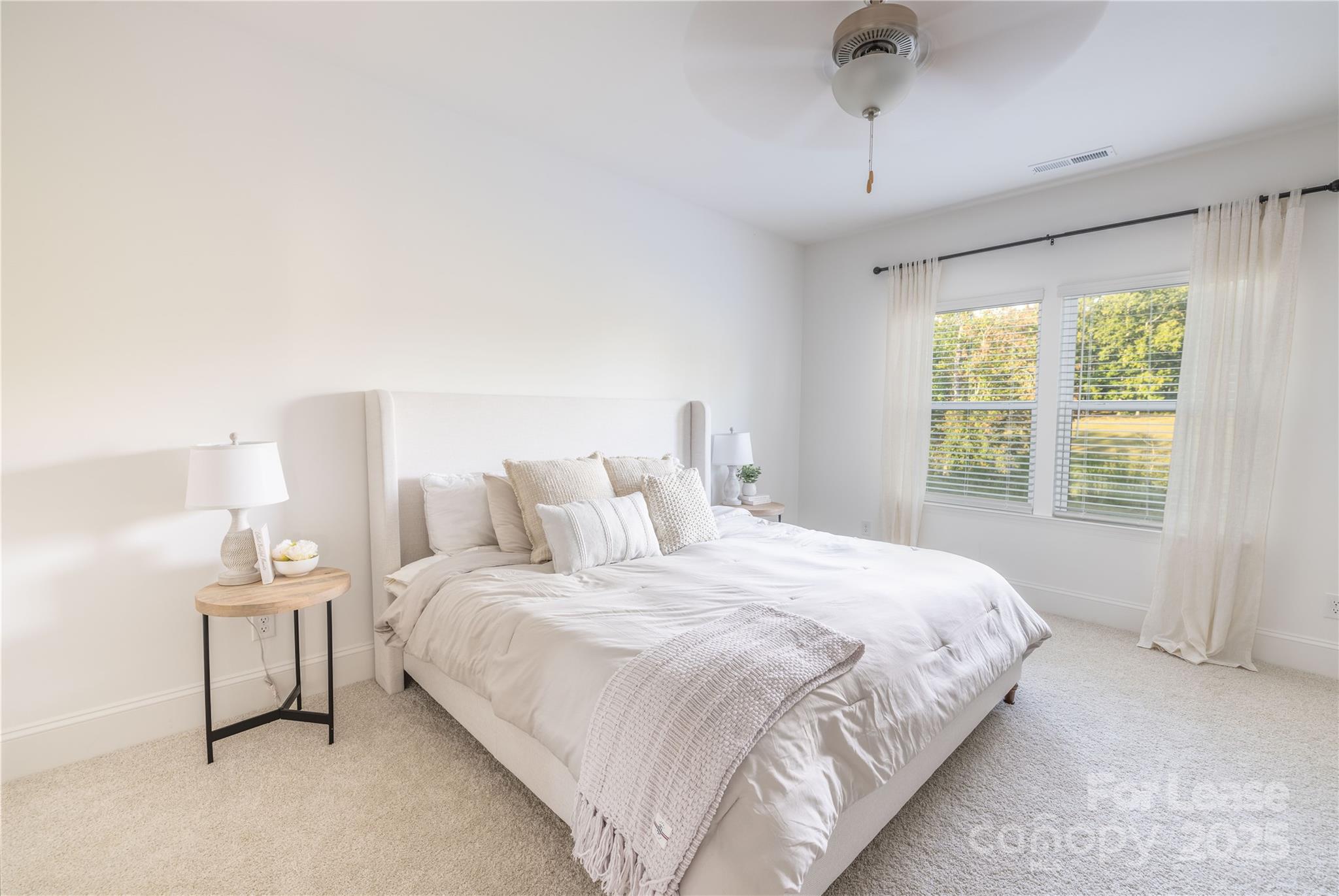 173 Tillery Lane Mount Gilead, NC 27306 - Photo 5 of 28 a bedroom with a bed and a window