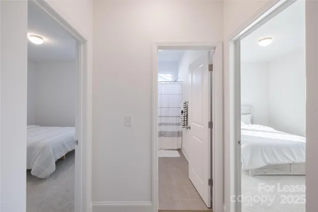 a bathroom with a tub and shower