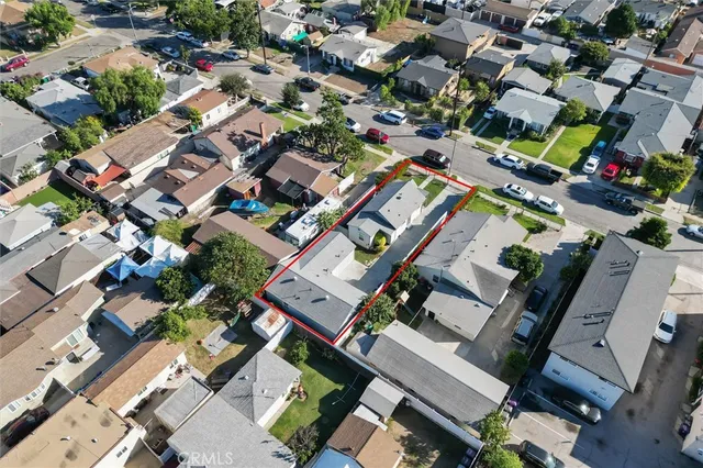 an aerial view of a city with lots of residential buildings