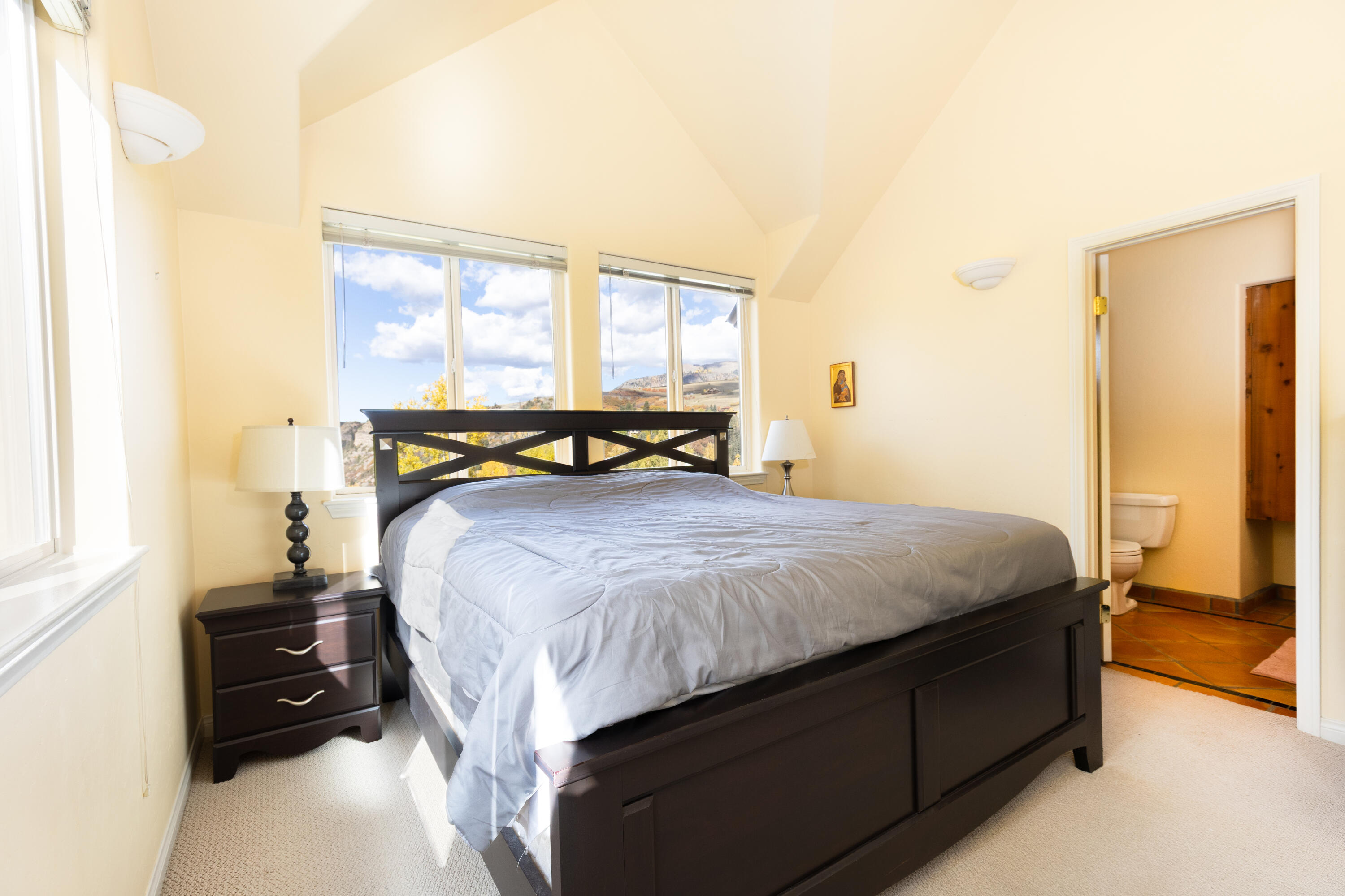 464 San Miguel Ridge, Unit 1 Telluride, CO 81435 - Photo 15 of 27 a bedroom with a bed and a window