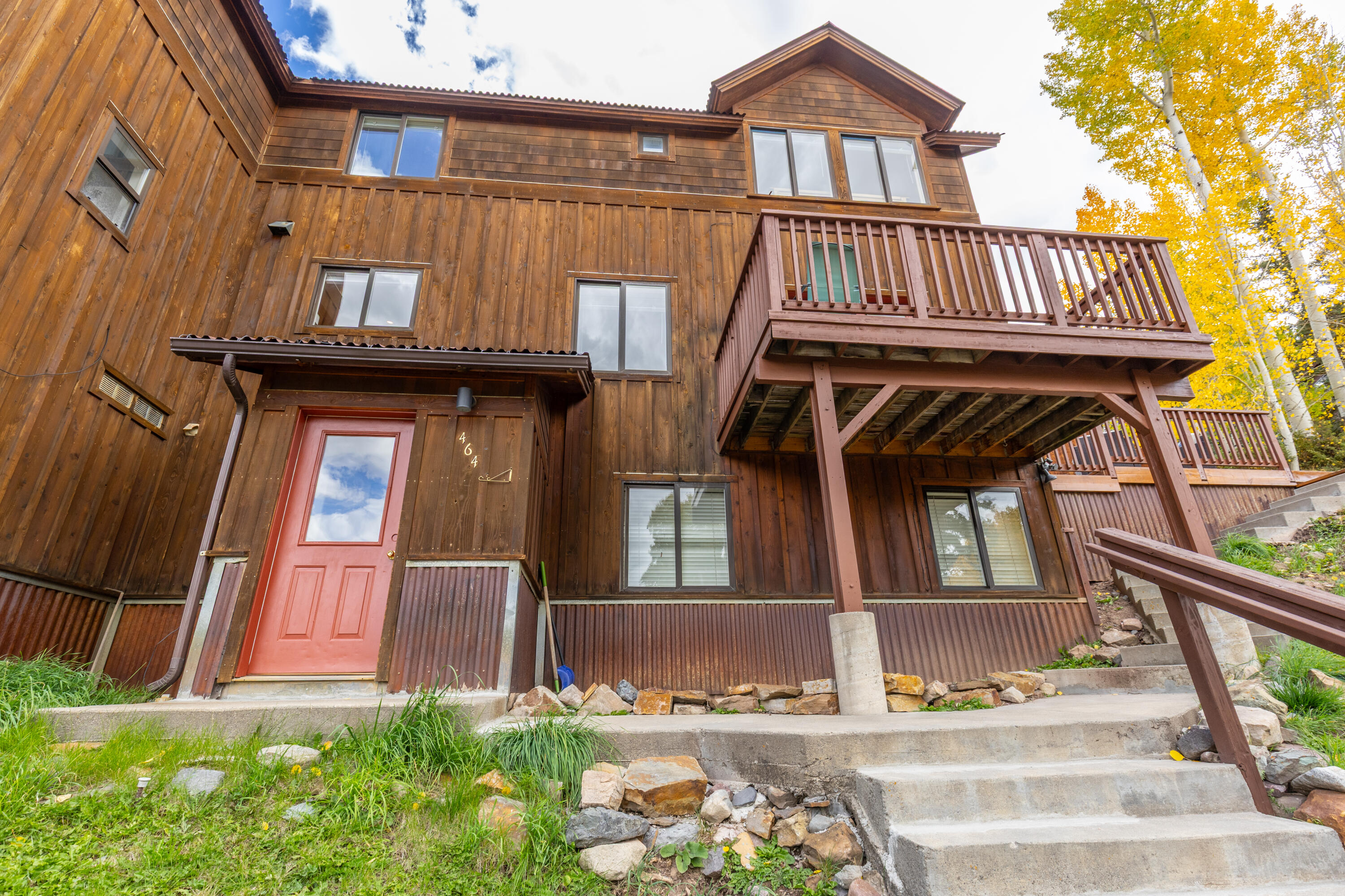 464 San Miguel Ridge, Unit 1 Telluride, CO 81435 - Photo 26 of 27 front view of a house with a small yard