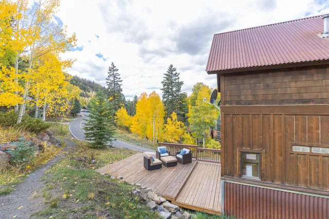 a view of sitting area in front of house