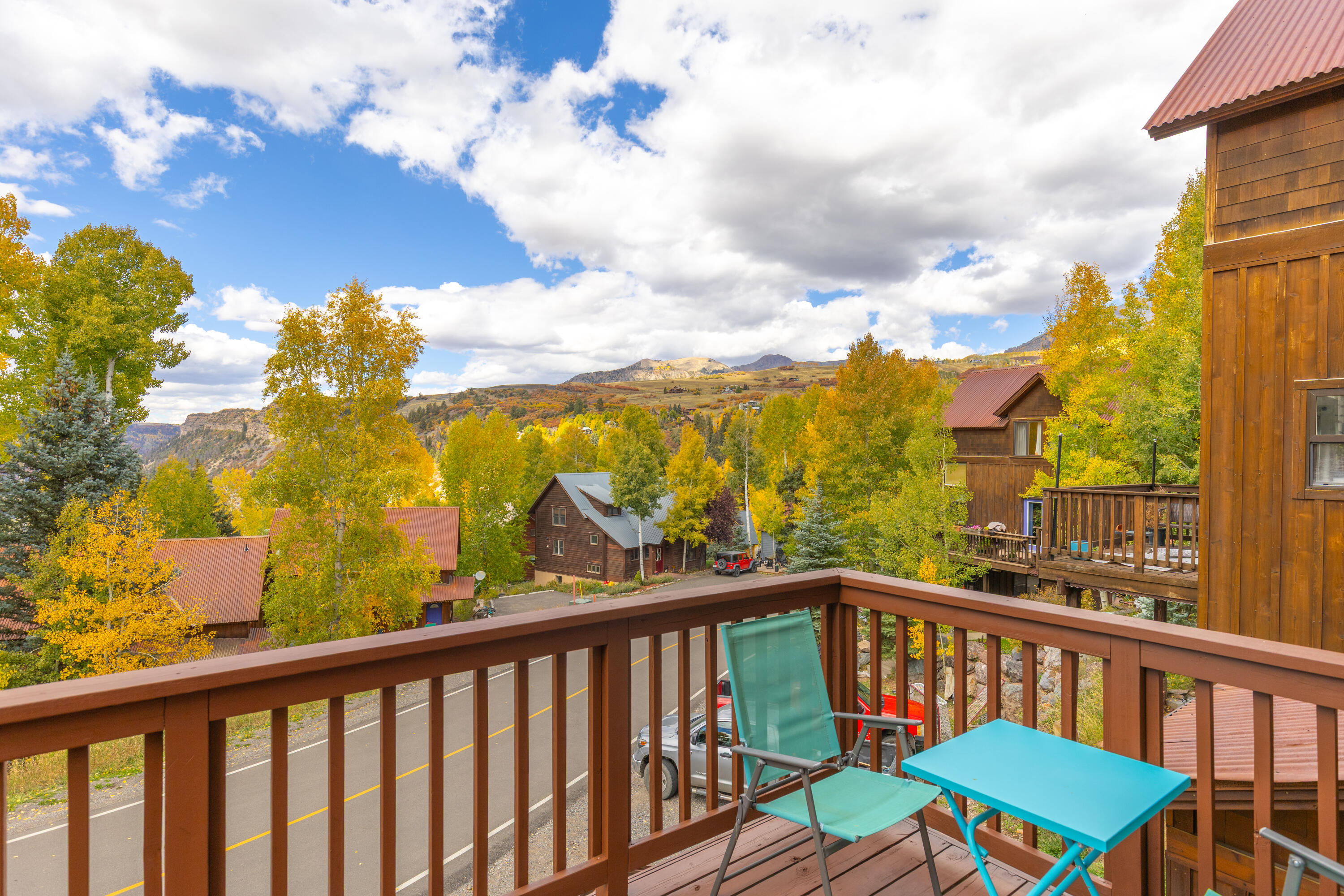 464 San Miguel Ridge, Unit 1 Telluride, CO 81435 - Photo 7 of 27 a view of a balcony with chairs