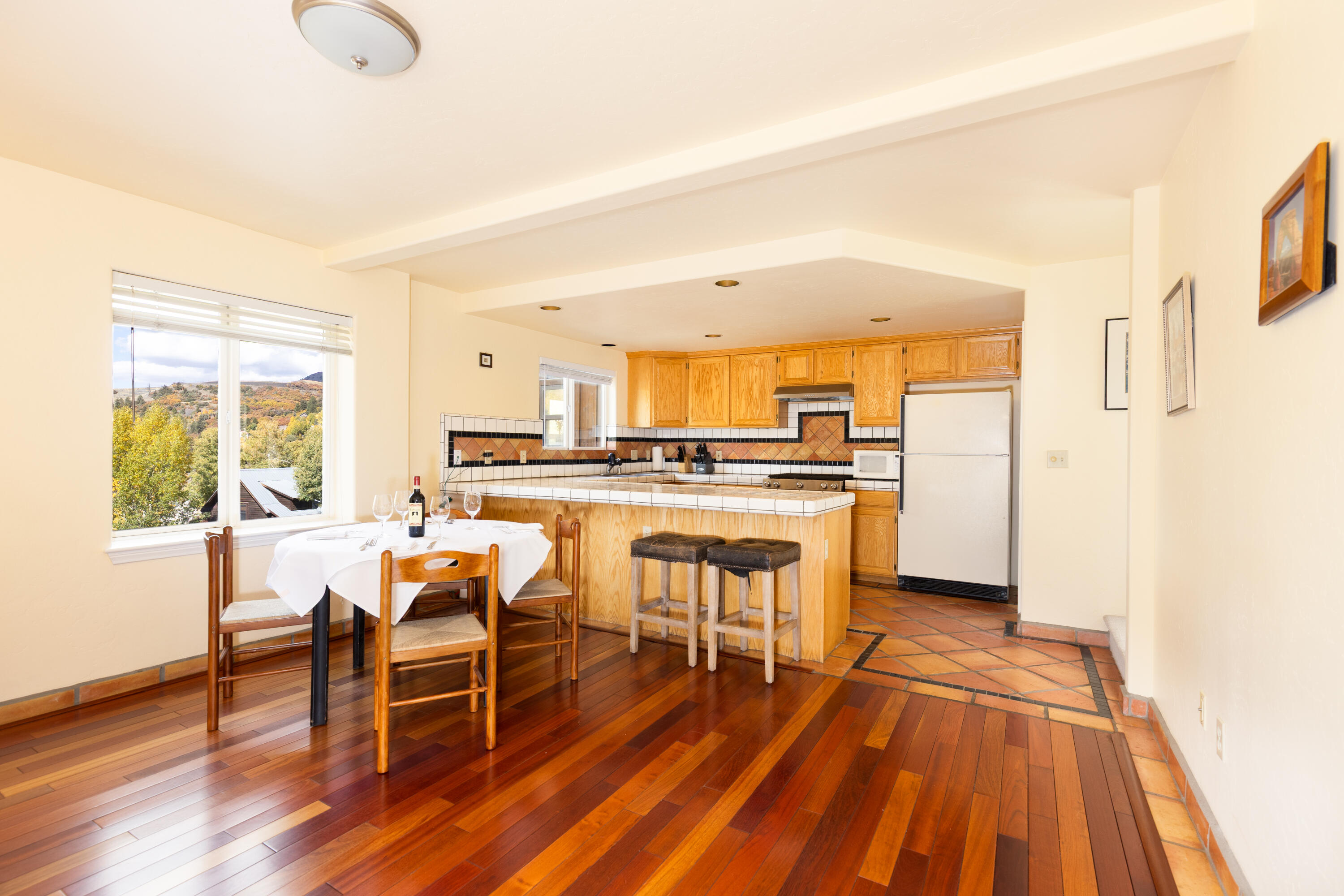 464 San Miguel Ridge, Unit 1 Telluride, CO 81435 - Photo 8 of 27 a dining room with furniture and wooden floor