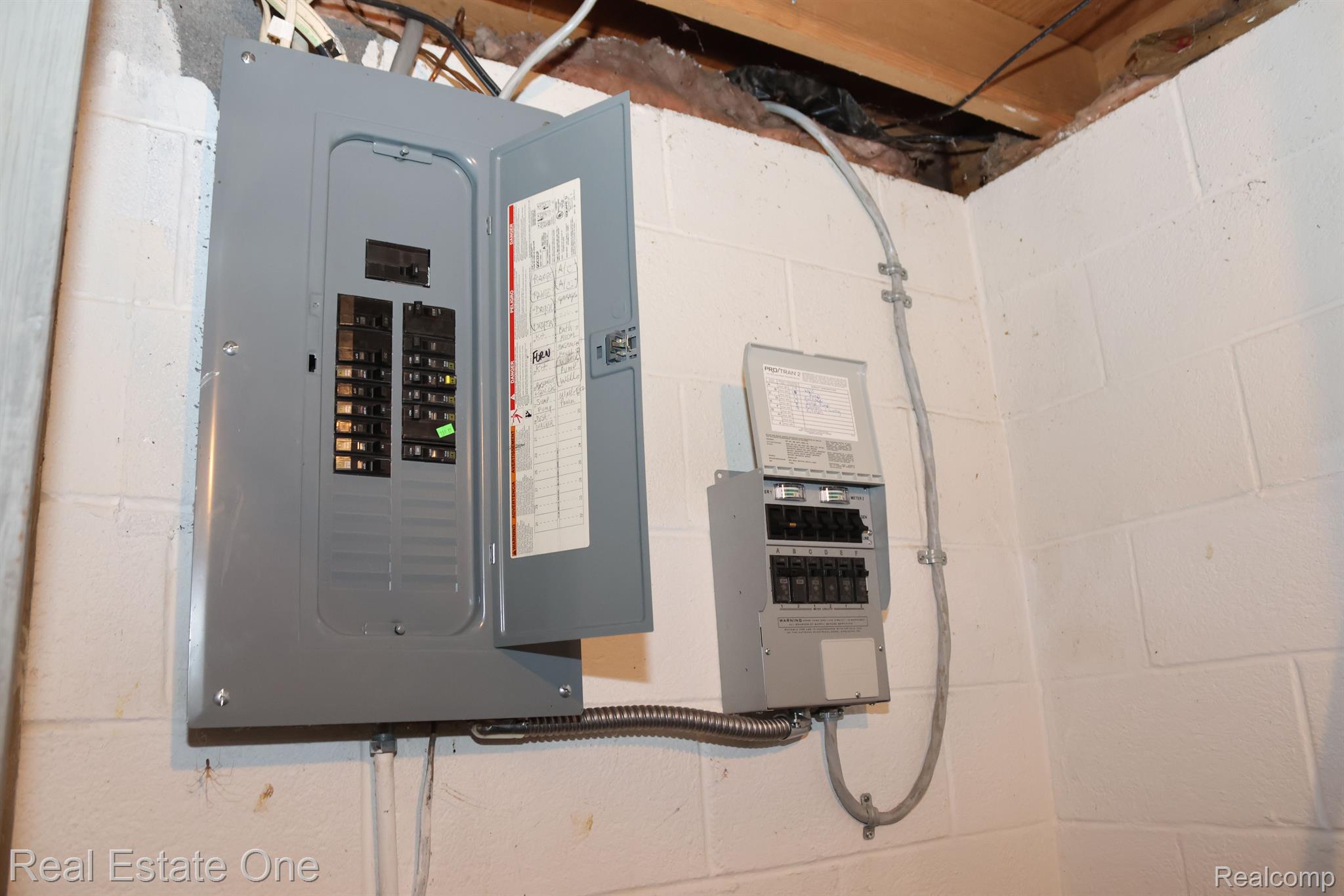 7990 Wiggins Road Howell, MI 48855 - Photo 21 of 33 Electrical box and Generator hookup