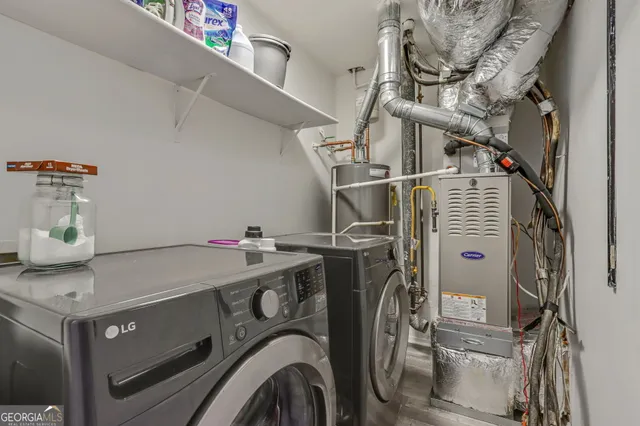 a utility room with dryer and washer