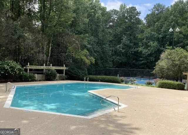 a view of a backyard with green space