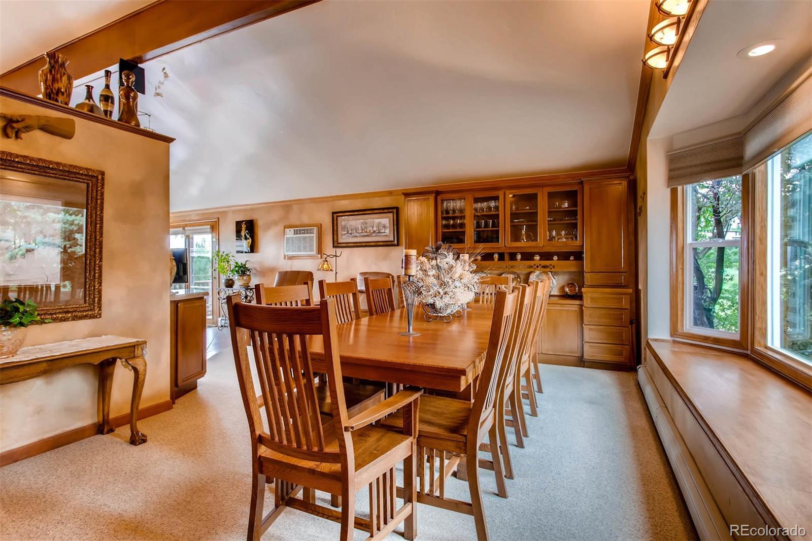 881 Valley Road Littleton, CO 80124 - Photo 13 of 27 a view of a dining room with furniture window and outside view