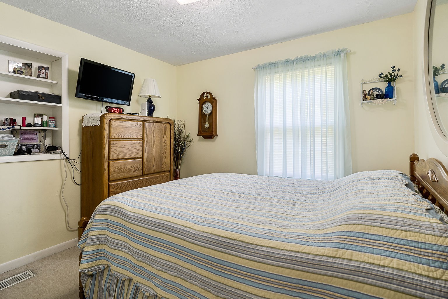 1514 Jefferson Road Smithville, TN 37166 - Photo 19 of 53 a bedroom with a bed and a flat screen tv