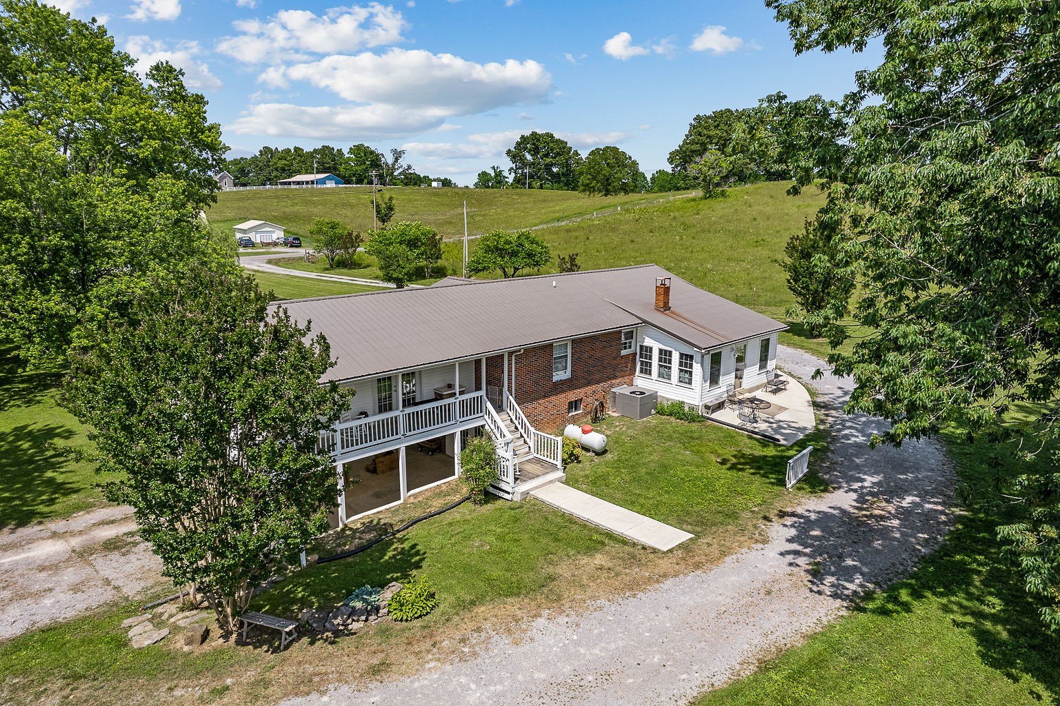 1514 Jefferson Road Smithville, TN 37166 - Photo 2 of 53 a view of a house with a garden