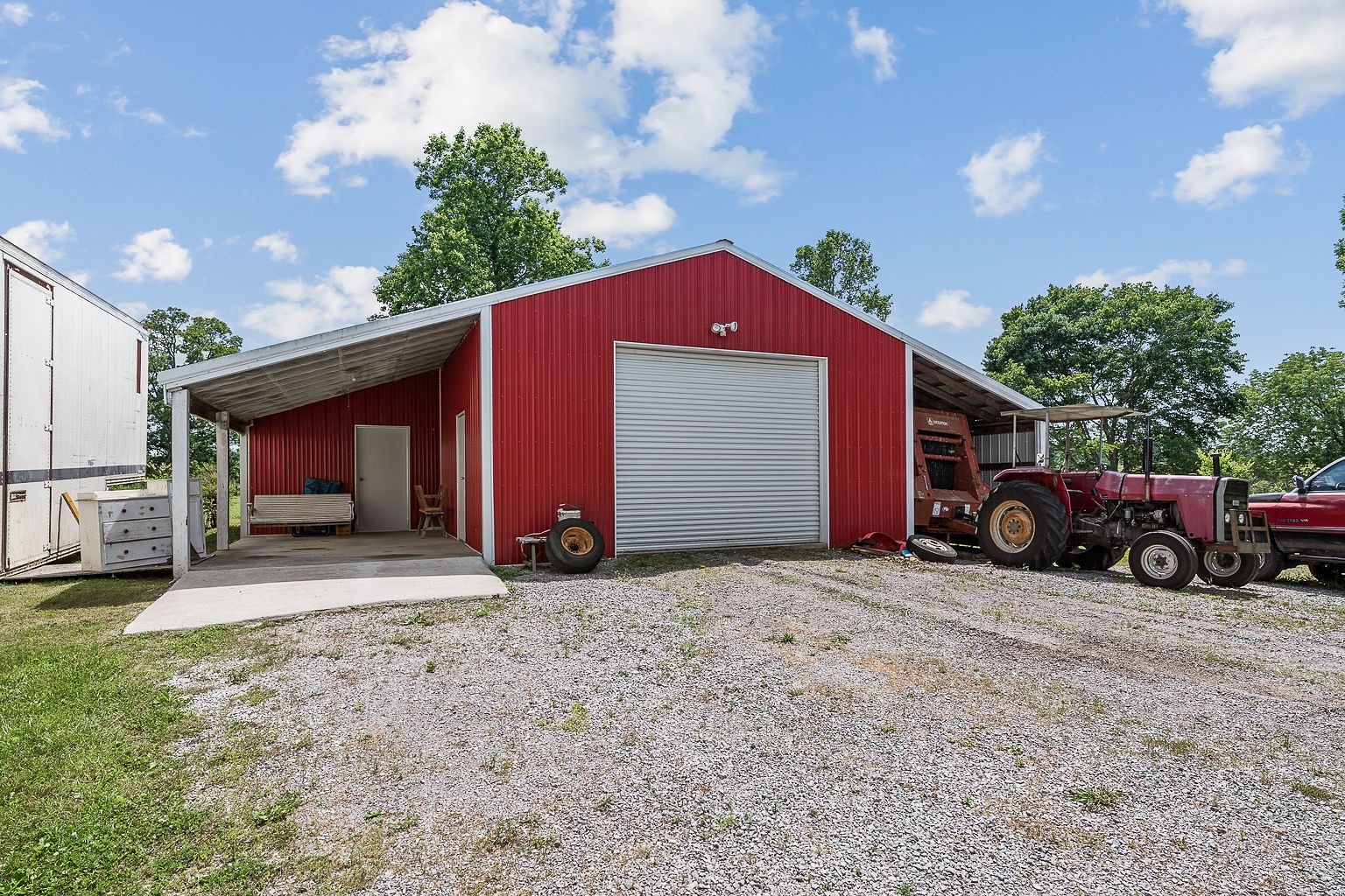 1514 Jefferson Road Smithville, TN 37166 - Photo 36 of 53 a view of a house with a yard and garage