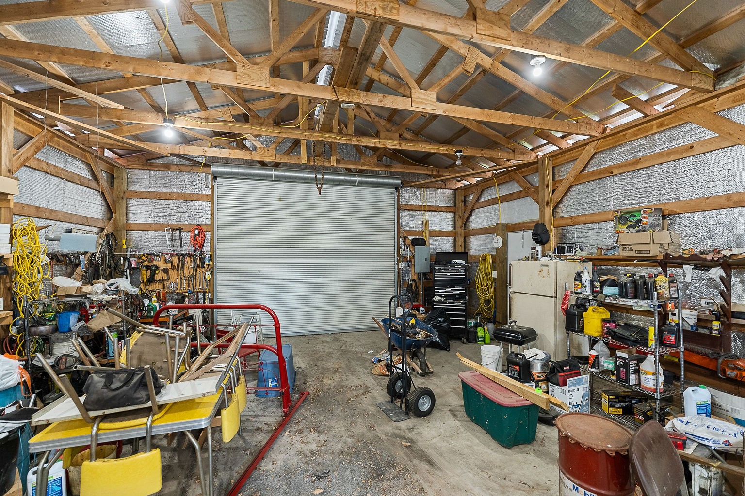 1514 Jefferson Road Smithville, TN 37166 - Photo 38 of 53 a view of a storage room with a lot of stuff