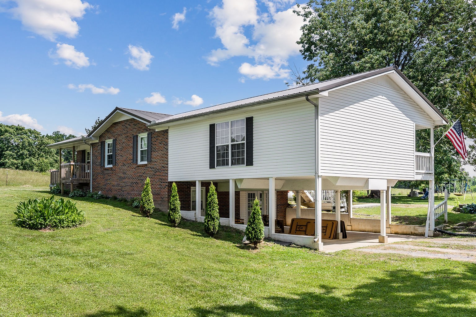 1514 Jefferson Road Smithville, TN 37166 - Photo 41 of 53 a view of a house with a yard and sitting area