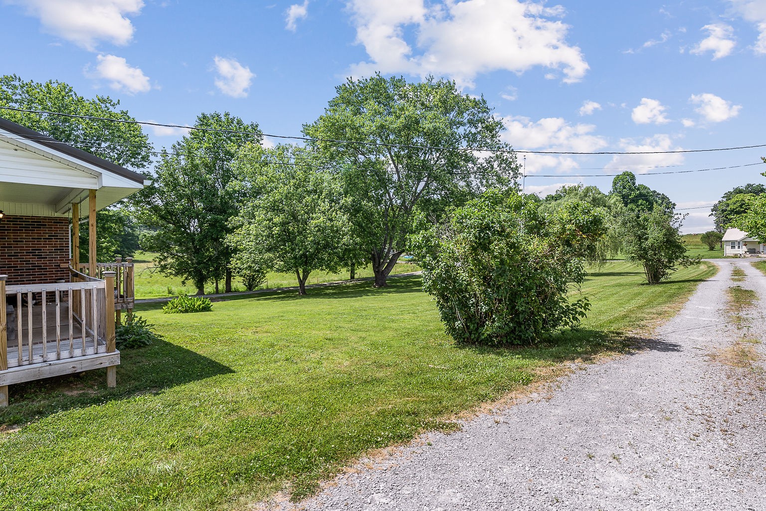 1514 Jefferson Road Smithville, TN 37166 - Photo 49 of 53 a view of a deck and a yard with green space