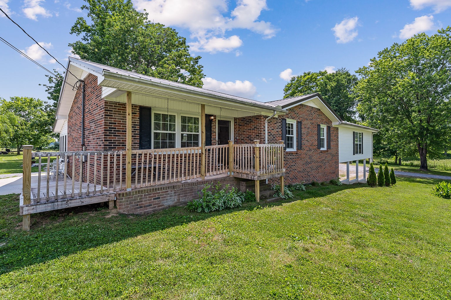 1514 Jefferson Road Smithville, TN 37166 - Photo 50 of 53 a view of a house with a yard and deck