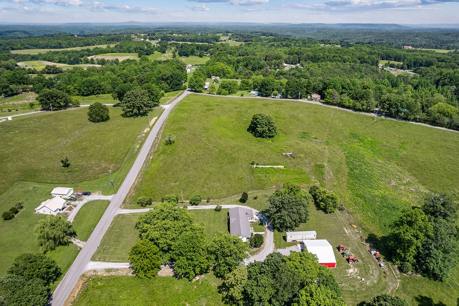 1514 Jefferson Road Smithville, TN 37166 - Photo 9 of 53 an aerial view of a residential houses with outdoor space and street view