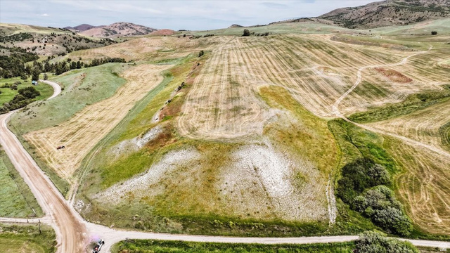 5588 East Glendale Road Preston, ID 83263 - Photo 7 of 11 Expansive rolling terrain featuring a mix of cultivated fields and natural grasslands