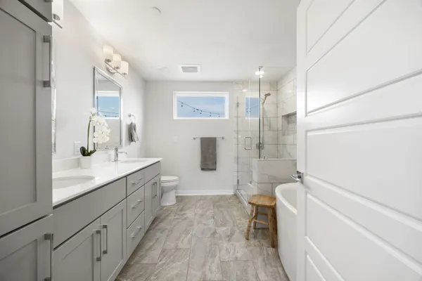 a view of a living room and entryway