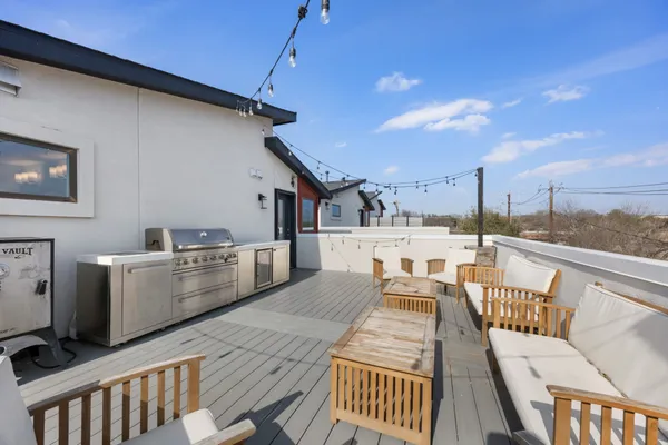 a bathroom with a sink mirror and a bathtub