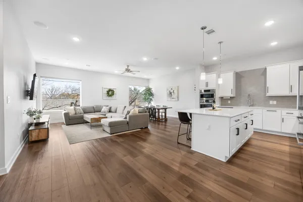 a view of backyard space and tree