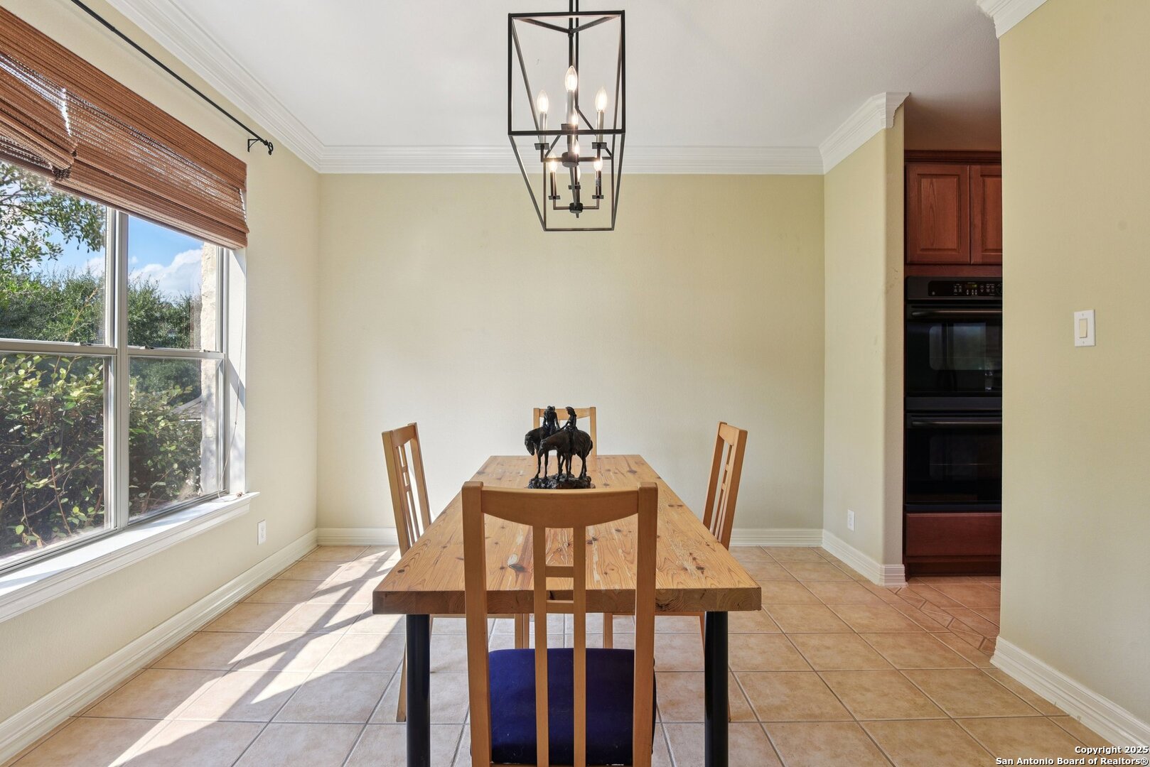 522 Heather Ridge San Antonio, TX 78260 - Photo 12 of 41 a dining room with furniture and window