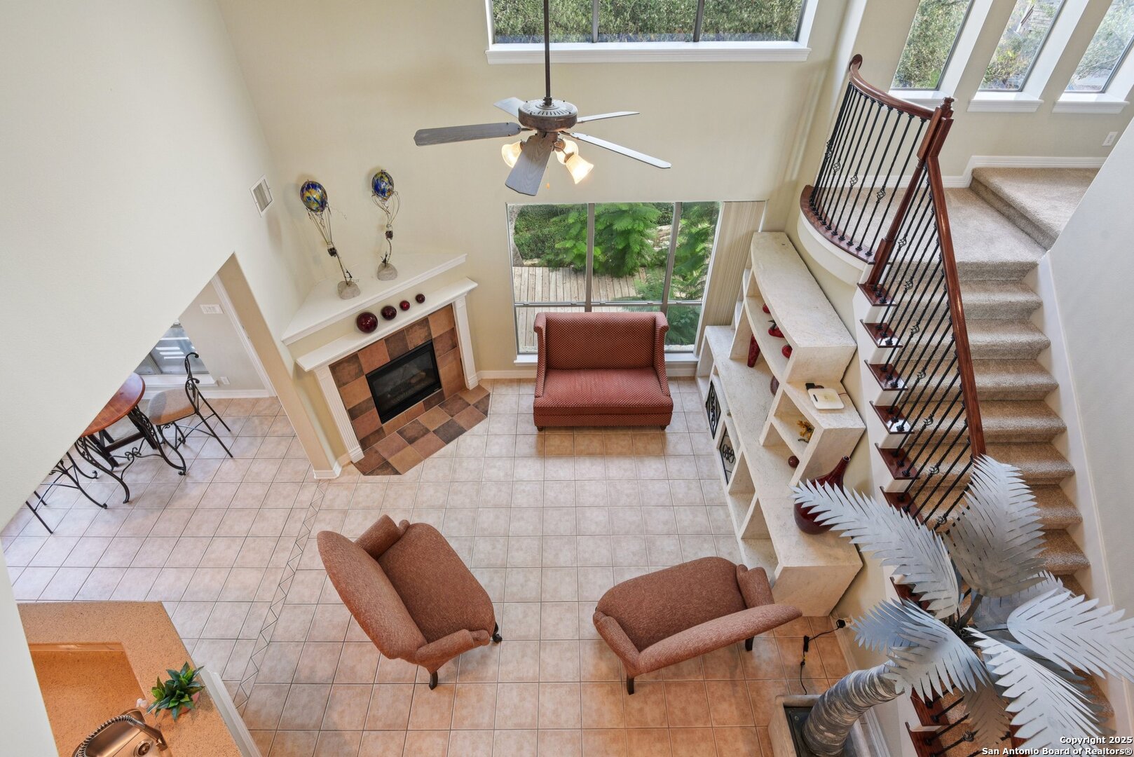 522 Heather Ridge San Antonio, TX 78260 - Photo 15 of 41 a living room with furniture and a fireplace
