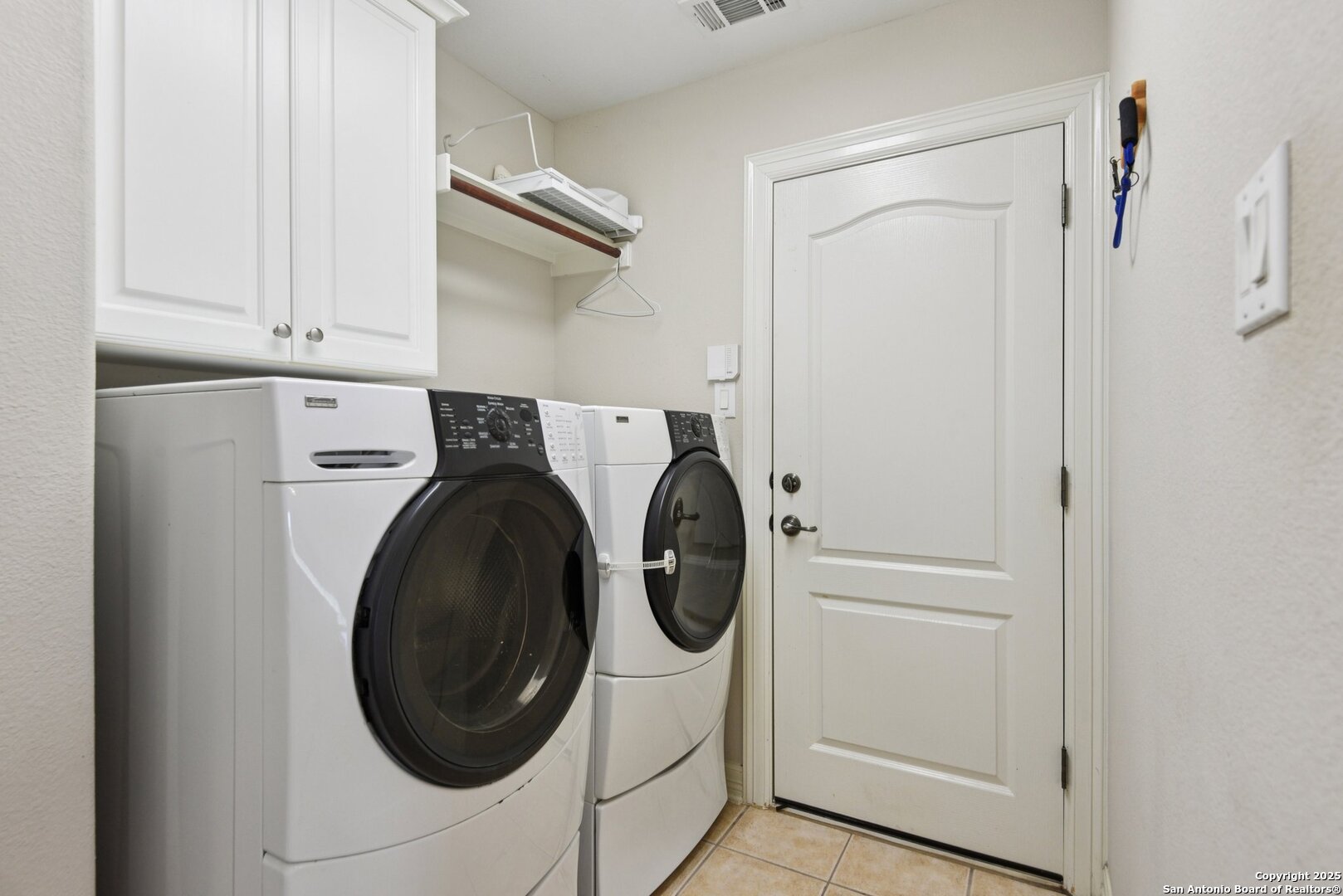522 Heather Ridge San Antonio, TX 78260 - Photo 16 of 41 a utility room with dryer and washer