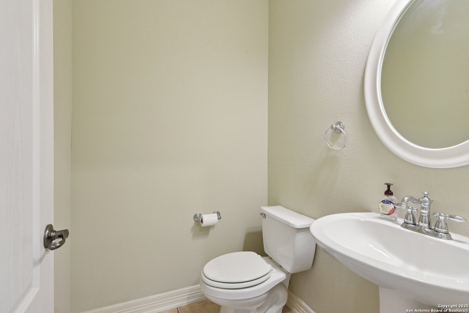 522 Heather Ridge San Antonio, TX 78260 - Photo 17 of 41 a white toilet sitting next to a bathroom sink