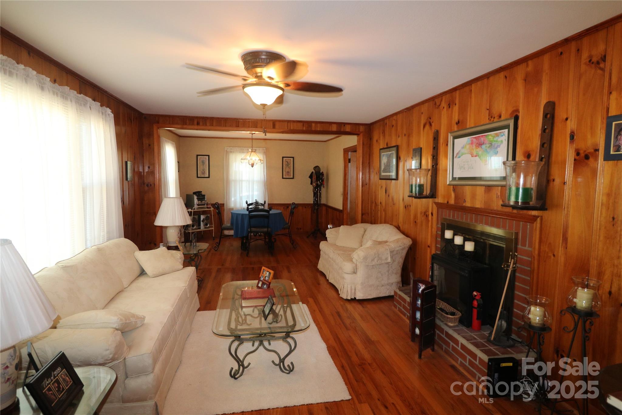 1260 Highway 221 Rutherfordton, NC 28139 - Photo 13 of 30 a living room with furniture fireplace and a flat screen tv
