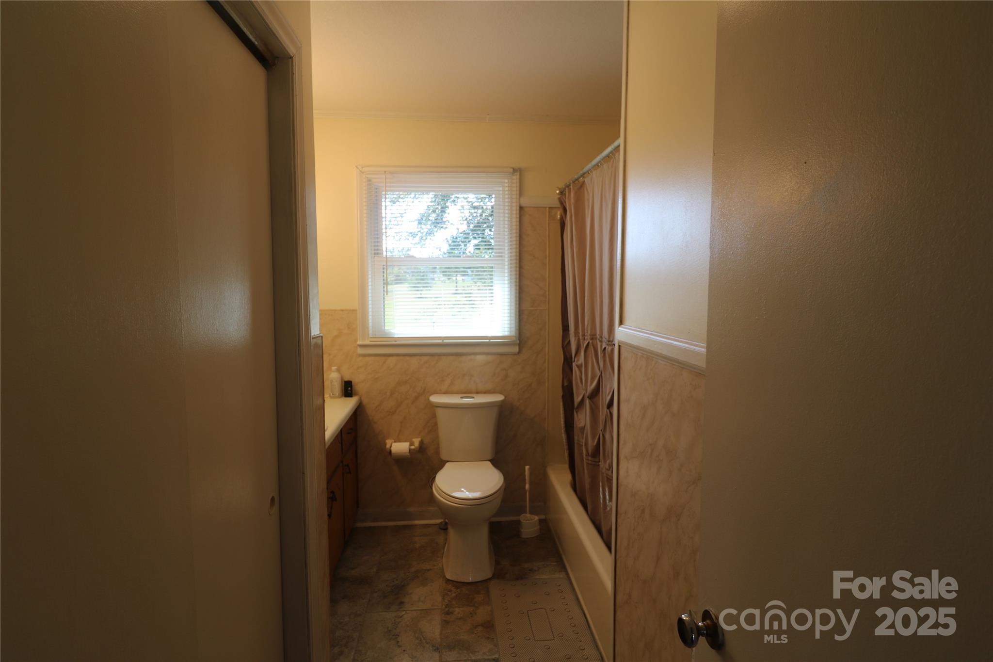 1260 Highway 221 Rutherfordton, NC 28139 - Photo 23 of 30 a bathroom with a toilet and a sink