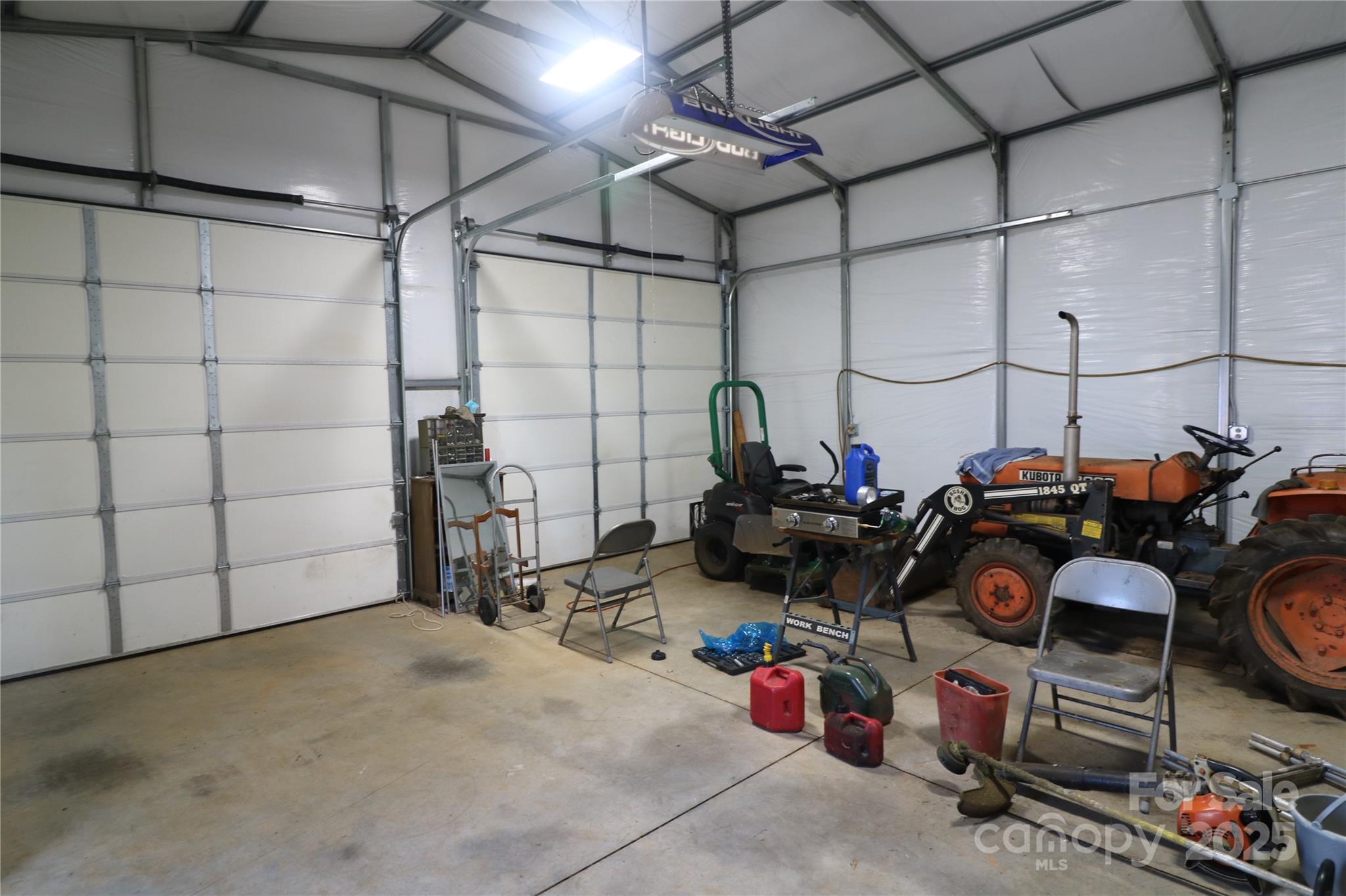 1260 Highway 221 Rutherfordton, NC 28139 - Photo 27 of 30 a view of a storage room with washer and dryer