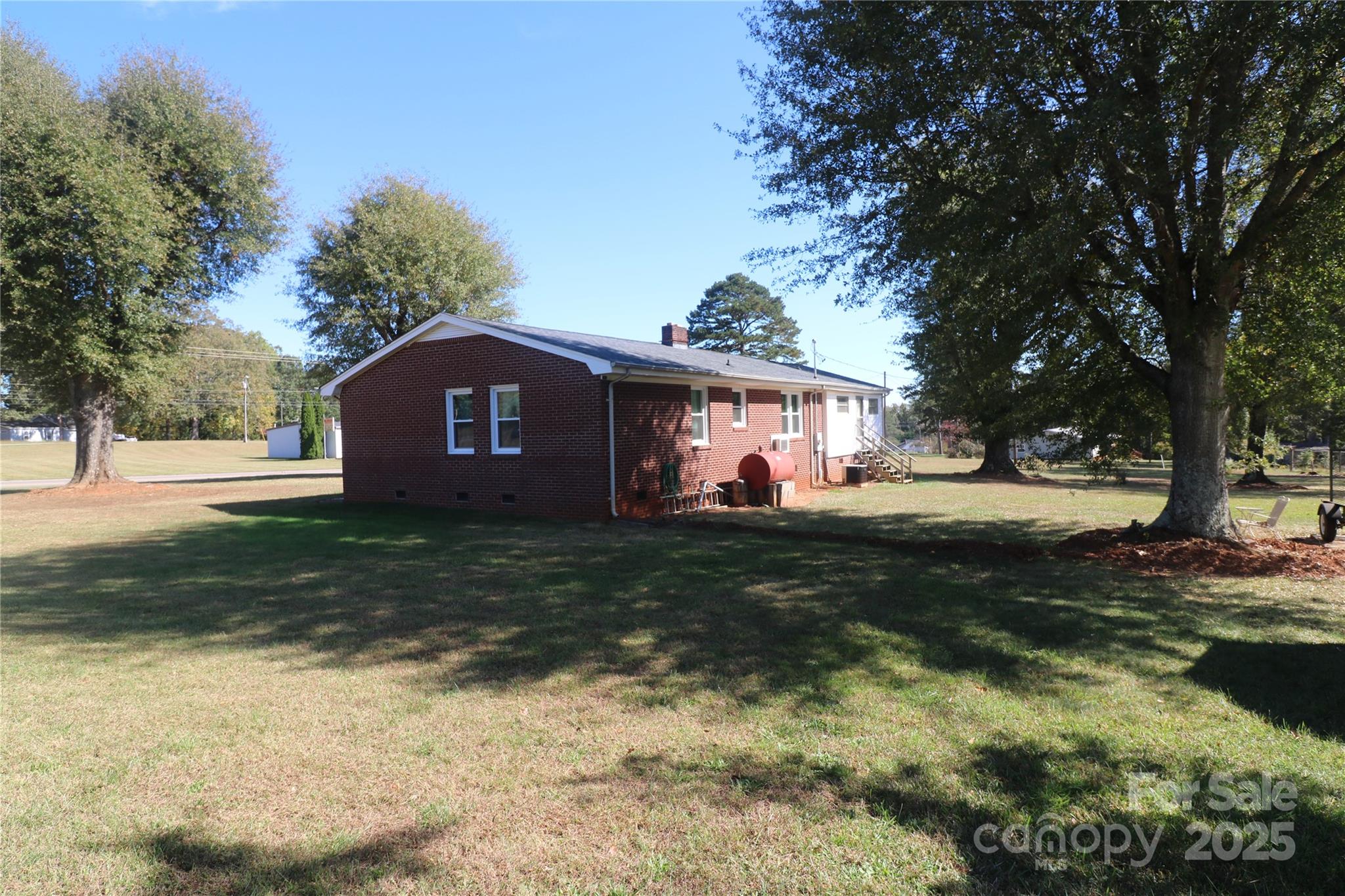 1260 Highway 221 Rutherfordton, NC 28139 - Photo 4 of 30 a front view of a house with garden