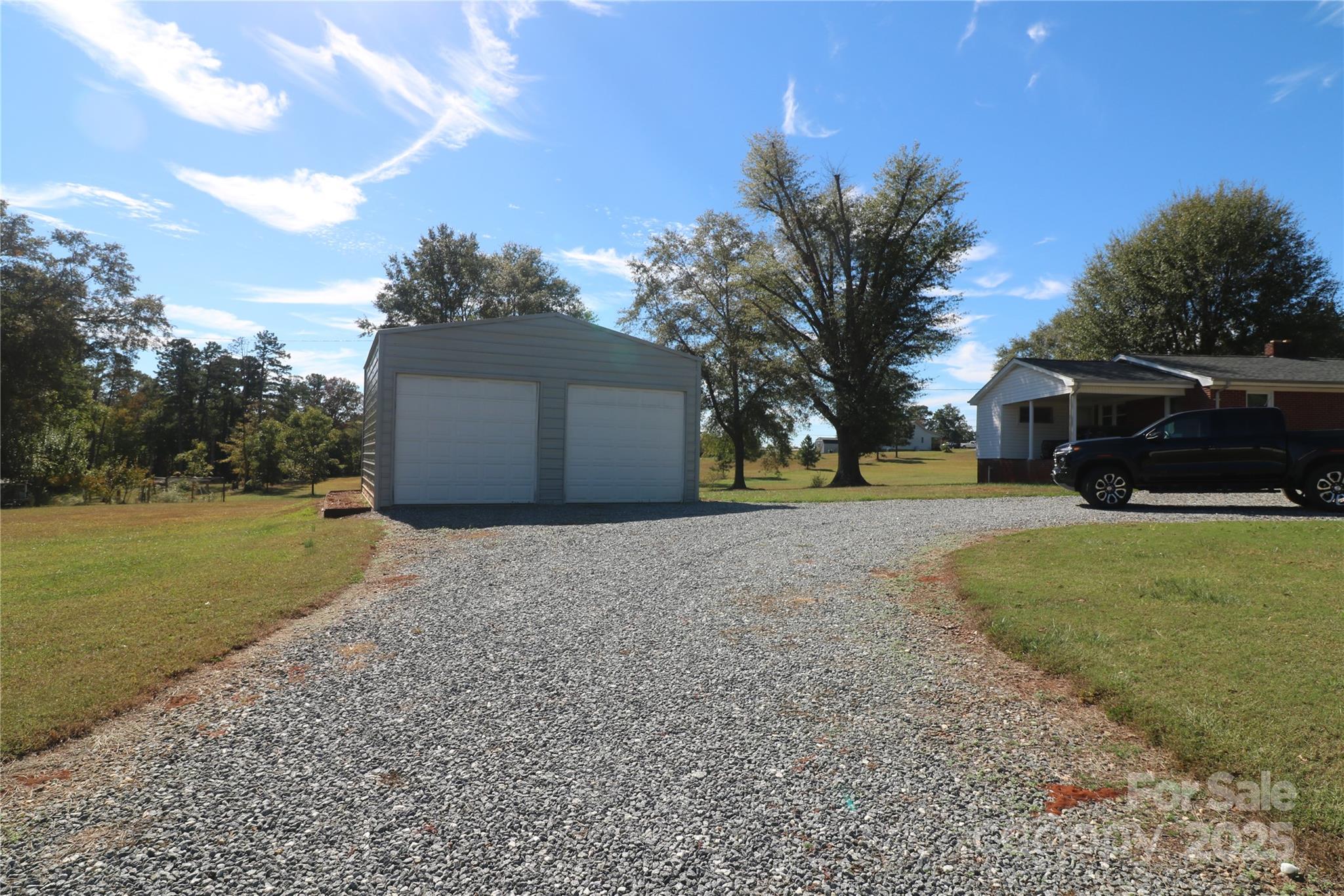 1260 Highway 221 Rutherfordton, NC 28139 - Photo 8 of 30 a view of a yard with a house