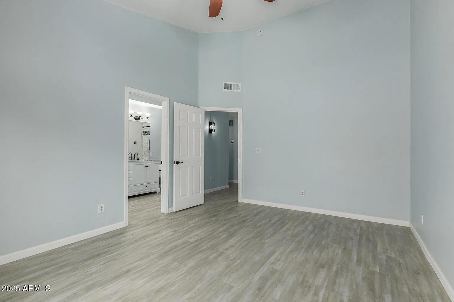 45 East 9th Place, Unit 80 Mesa, AZ 85201 - Photo 11 of 38 wooden floor in an empty room