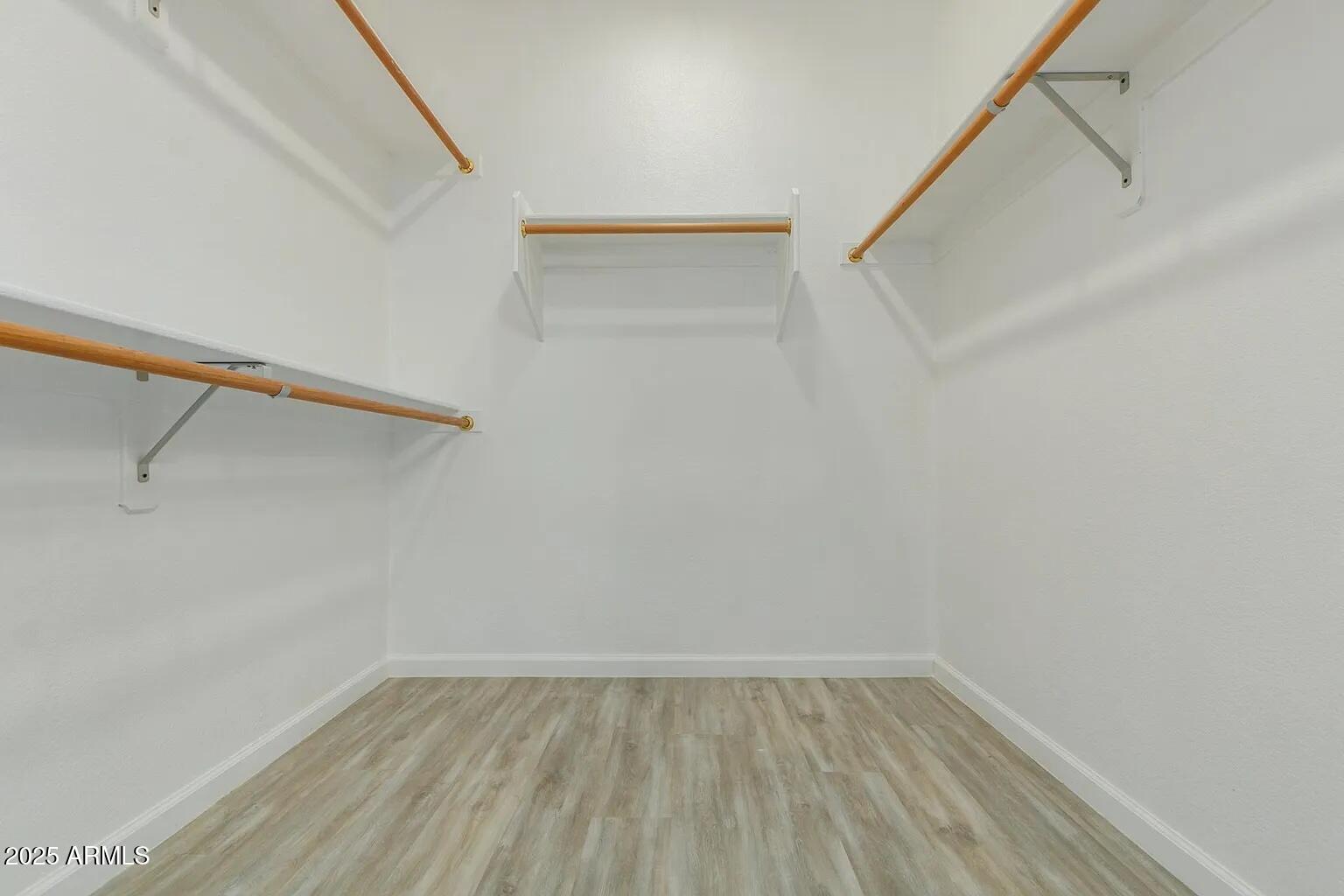 45 East 9th Place, Unit 80 Mesa, AZ 85201 - Photo 21 of 38 a view of an empty walk in closet