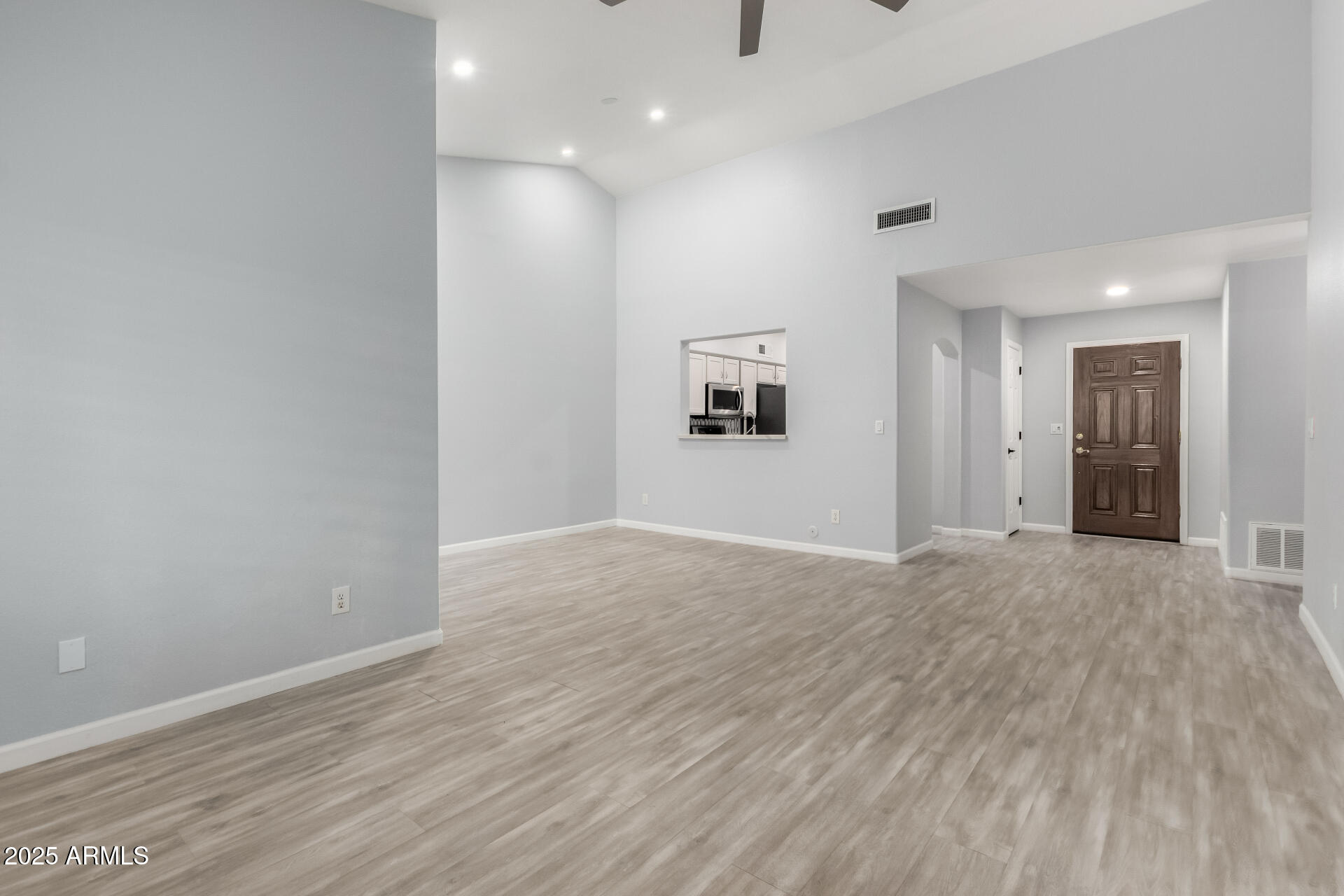 45 East 9th Place, Unit 80 Mesa, AZ 85201 - Photo 23 of 38 a view of empty room with wooden floor