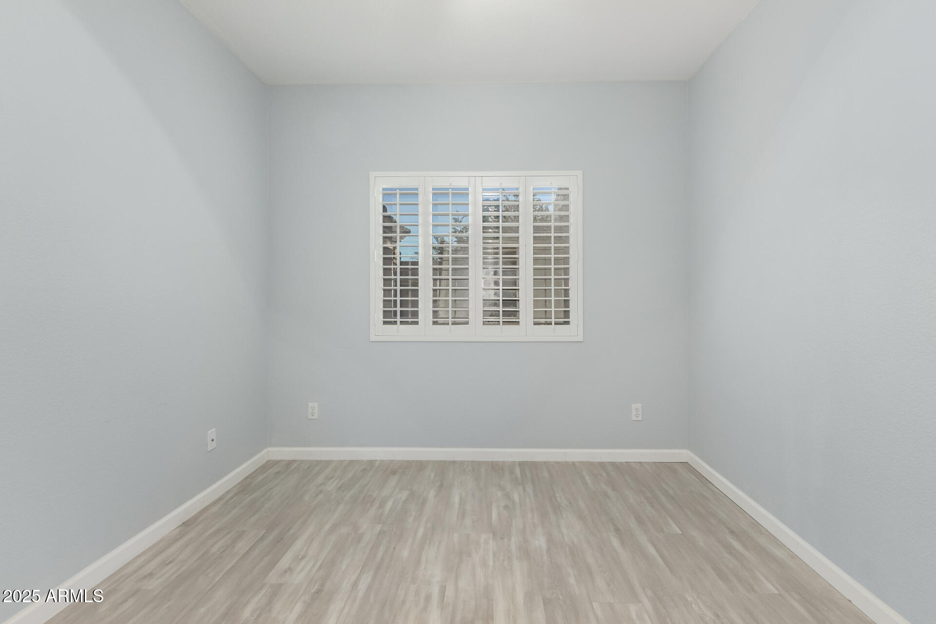 45 East 9th Place, Unit 80 Mesa, AZ 85201 - Photo 30 of 38 wooden floor in an empty room with a window