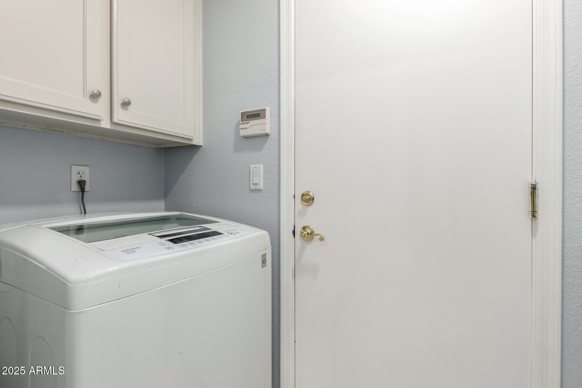 45 East 9th Place, Unit 80 Mesa, AZ 85201 - Photo 32 of 38 a utility room with dryer and washer