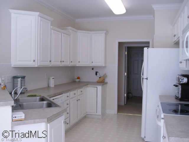 7904 Cress Court Oak Ridge, NC 27310 - Photo 4 of 9 Other. Bright Kitchen