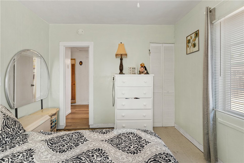2113 Princeton Street Delano, CA 93215 - Photo 17 of 32 a view of a bedroom with a window and cabinet
