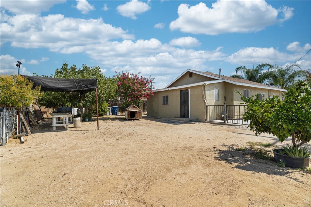 2113 Princeton Street Delano, CA 93215 - Photo 25 of 32 a view of a house with a patio
