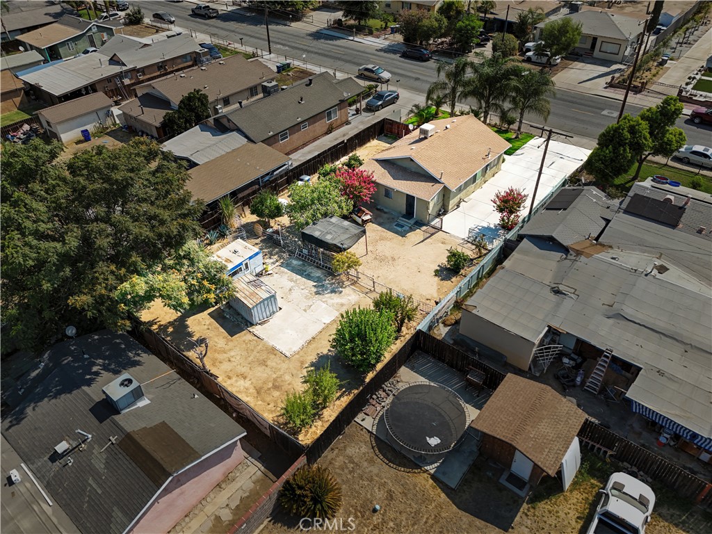 2113 Princeton Street Delano, CA 93215 - Photo 31 of 32 an aerial view of a house with a garden