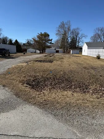 a view of a yard with an outdoor space