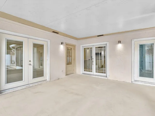a kitchen with stainless steel appliances a refrigerator sink and microwave