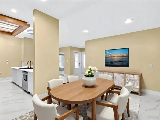 a kitchen with a sink and a refrigerator