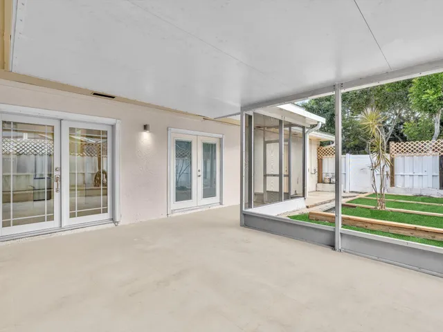 a view of a bathroom from a hallway