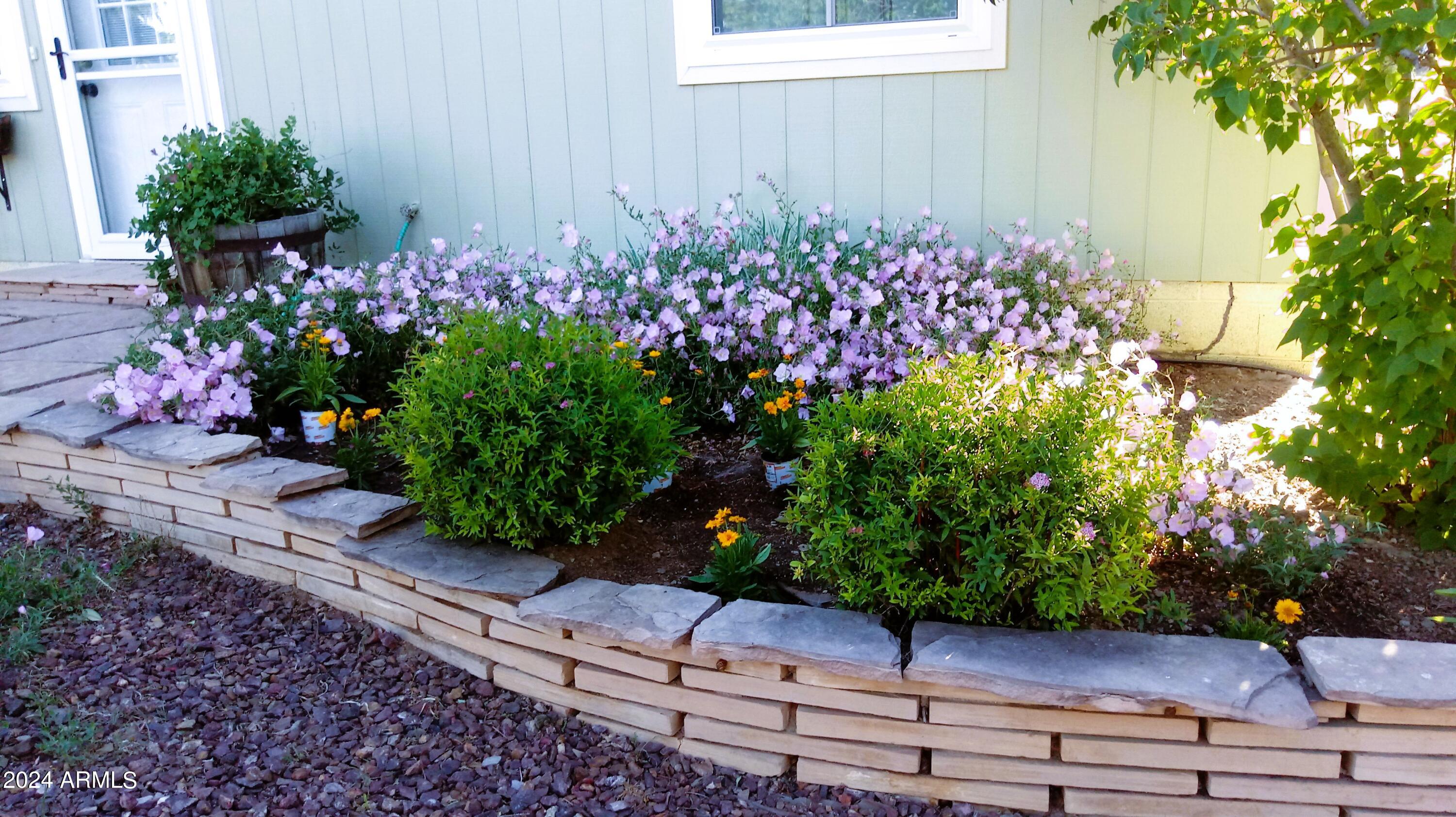 3442 North Tower Road Prescott Valley, AZ 86314 - Photo 52 of 64 Lilac Bush+perenials