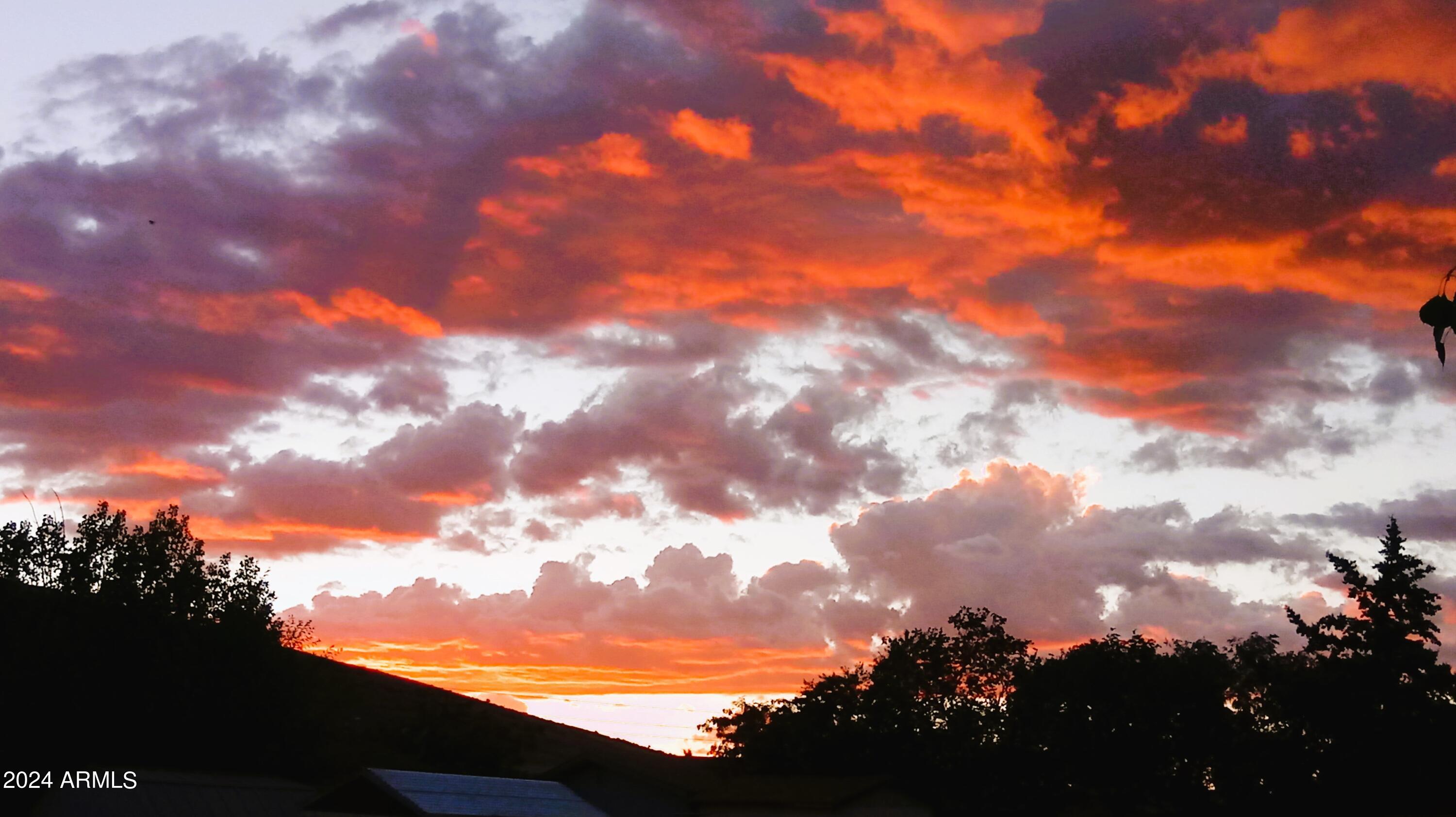 3442 North Tower Road Prescott Valley, AZ 86314 - Photo 58 of 64 Backyard sunset view - Summer 2